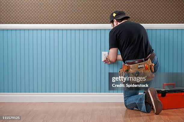 handyman working in empty room - toolbox stock pictures, royalty-free photos & images