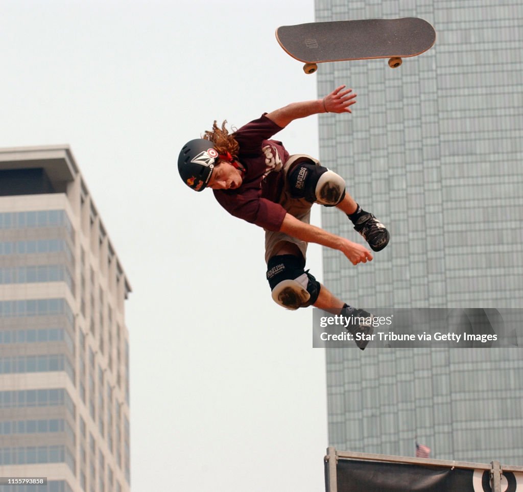 JOEY MCLEISTER ¥ jmcleister@startribune.com Minneapolis,Mn.,Tues.,Aug. 14, 2007--Professional skateboarder and snowboarder Shaun White showed his expertise on the "vert ramp" set up at Peavey Plaza. White and other action sports athletes participated