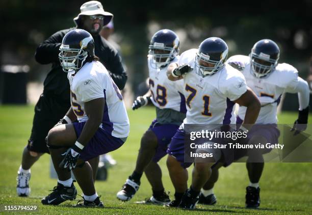 Jgholt@startribune.com 7/29/2007---Vikings defensive line coach Karl Dunbar leads the line through drills Sunday afternoon in Mankato.