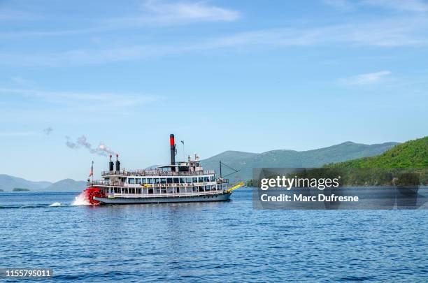 cruise ship on lake george - lake george new york stock pictures, royalty-free photos & images