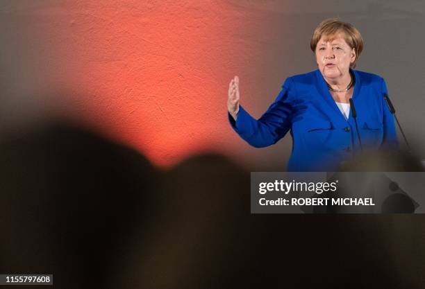 German Chancellor Angela Merkel speaks during a women's network meeting at the Albertinum museum in Dresden, eastern Germany, one and a half months...