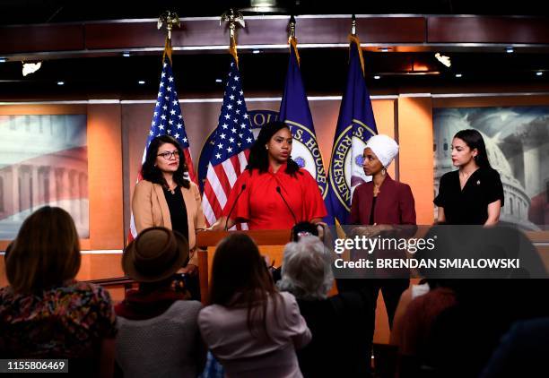 Representatives Ayanna Pressley speaks as, Ilhan Omar , Rashida Tlaib , and Alexandria Ocasio-Cortez look on during a press conference, to address...
