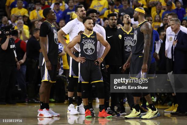 Stephen Curry of the Golden State Warriors reacts late in the game against the Toronto Raptors during Game Six of the 2019 NBA Finals at ORACLE Arena...