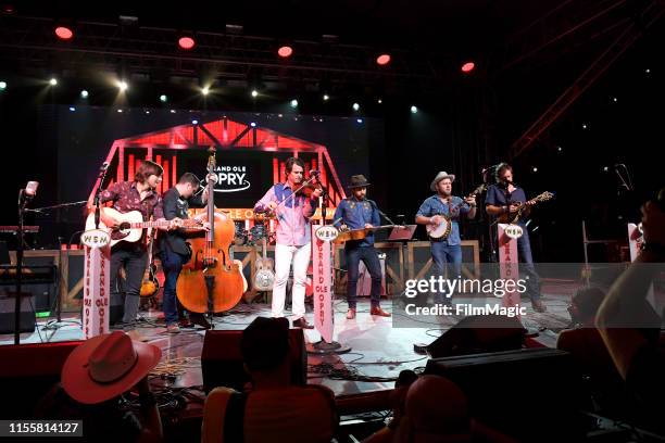 Charlie Worsham, Ketch Secor, Joe Andrews, Critter Fuqua, and Morgan Jahnig of Old Crow Medicine Show perform with Grand Ole Opry onstage at That...