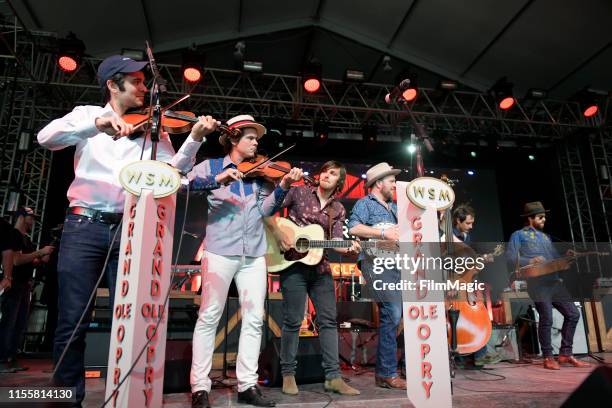 Ketch Secor, Charlie Worsham, Critter Fuqua, Morgan Jahnig, and Joe Andrews of Old Crow Medicine Show performs with Grand Ole Opry onstage at That...