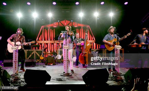 Charlie Worsham, Ketch Secor, Morgan Jahnig, Critter Fuqua, and Joe Andrews of Old Crow Medicine Show perform with Grand Ole Opry onstage at That...