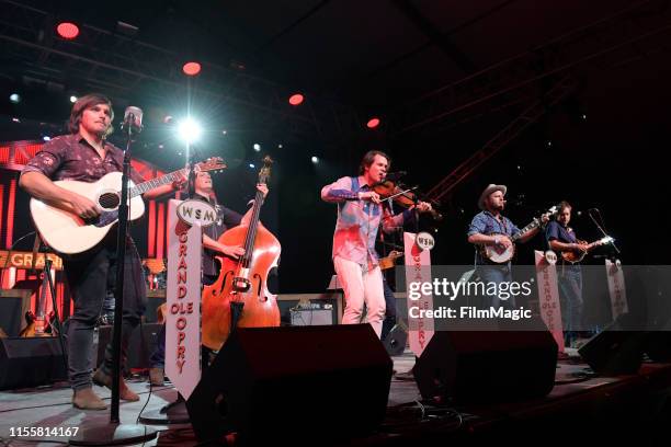 Charlie Worsham, Morgan Jahnig, Ketch Secor, Critter Fuqua, and Joe Andrews of Old Crow Medicine Show perform with Grand Ole Opry onstage at That...