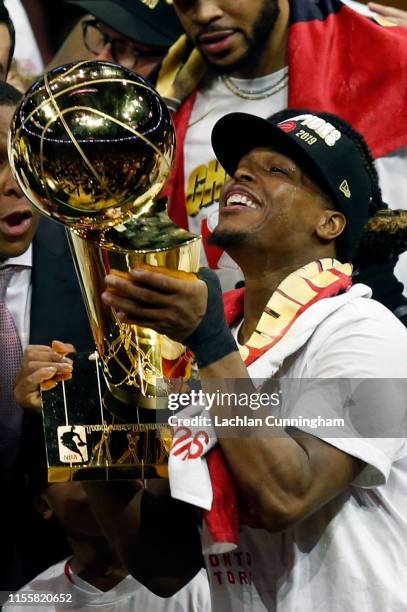 Kyle Lowry the Toronto Raptors celebrates with the Larry O'Brien Championship Trophy after his team defeated the Golden State Warriors to win Game...