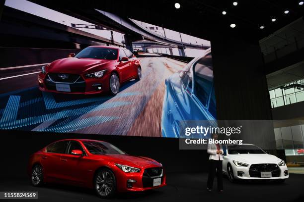 Asako Hoshino, executive vice president of Nissan Motor Co. Speaks during a launch of the company's Skyline GT vehicle at the company's headquarters...