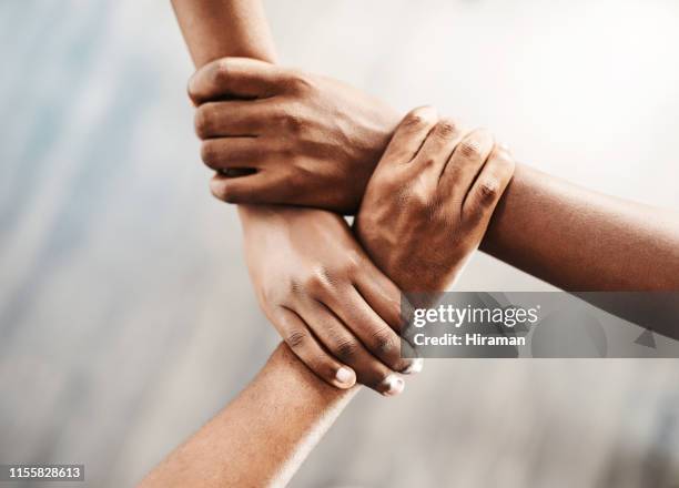 sterk samen staan - africa unite stockfoto's en -beelden