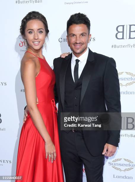 Emily MacDonagh and Peter Andre attend the Butterfly Ball 2019 at The Grosvenor House Hotel on June 13, 2019 in London, England.