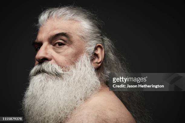 A Portrait Of A Senior Man With A White Beard And Long Grey Hair Tied Back  High-Res Stock Photo - Getty Images