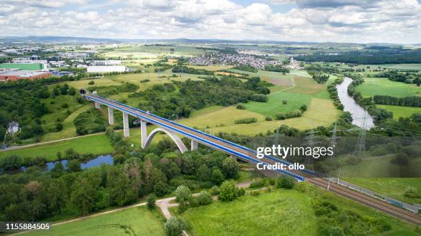 railway bridge over lahn river - high speed train germany stock pictures, royalty-free photos & images