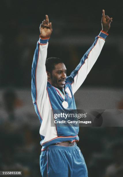 Henry Tillman of the United States celebrates the gold medal after defeating Willie deWit of Canada in the Men's Heavyweight Boxing competition at...