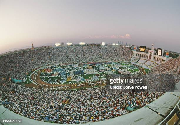 Athletes parade around the stadium infield during the opening ceremony for the XXIII Olympic Games on 28 July 1984 at the Los Angeles Memorial...