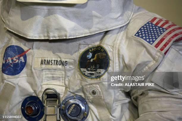 Neil Armstrong's Apollo 11 spacesuit is seen after being unveiled for the first time in thirteen years, at the Smithsonian National Air and Space...