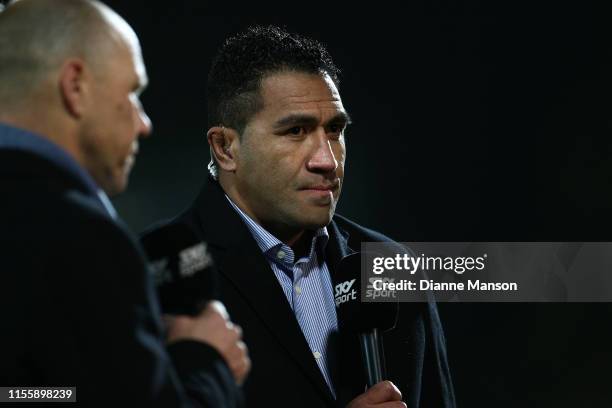 Sky Sport presenter Mils Muliaina looks on prior to the round 18 Super Rugby match between the Highlanders and the Waratahs at Rugby Park Stadium on...