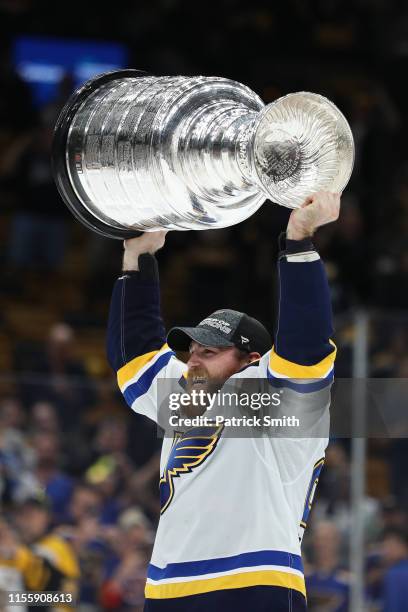 Ryan O'Reilly of the St. Louis Blues hoists the Stanley Cup after defeating the Boston Bruins, 4-1, to win Game Seven of the 2019 NHL Stanley Cup...