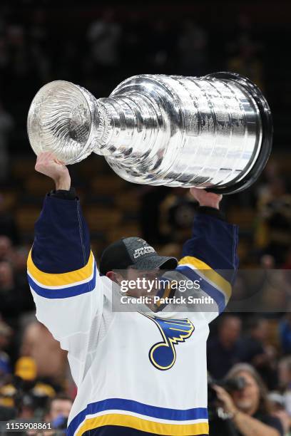 Jordan Binnington of the St. Louis Blues celebrates with the Stanley Cup after defeating the Boston Bruins in Game Seven to win the 2019 NHL Stanley...