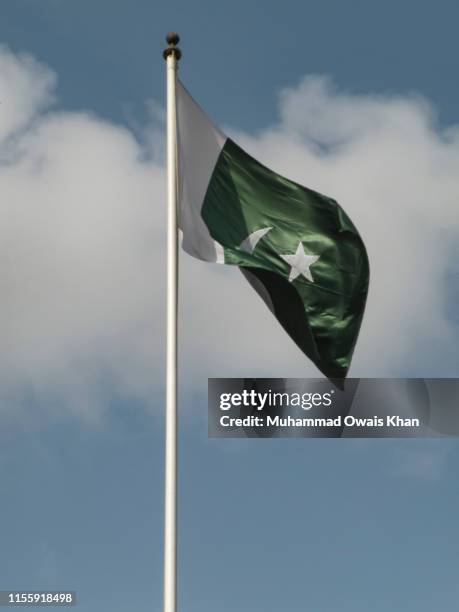 pakistan flags - pakistani flag stock pictures, royalty-free photos & images