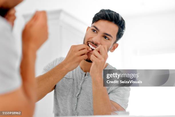 alway remember to floss regularly - dental floss stock pictures, royalty-free photos & images