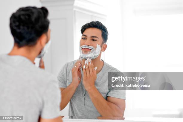 he's getting ready for a big day today - man shaving foam stock pictures, royalty-free photos & images