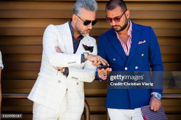 Guests seen during Pitti Immagine Uomo 96 on June 13, 2019 in Florence, Italy.