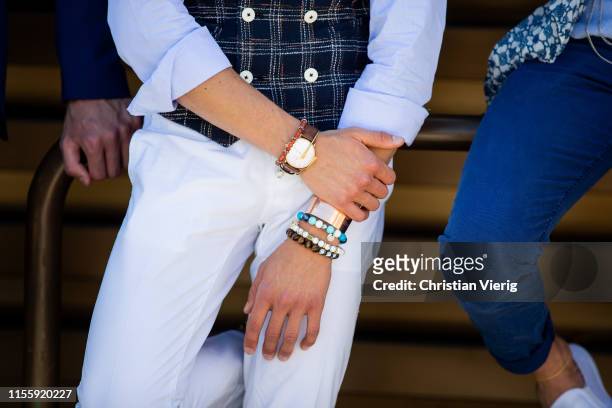 Guest is seen wearing jewellery and watch during Pitti Immagine Uomo 96 on June 13, 2019 in Florence, Italy.