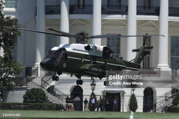 The Sikorsky VH-92 helicopter, which configured as the Marine One replacement, takes off from the South Lawn of the White House after a practice...