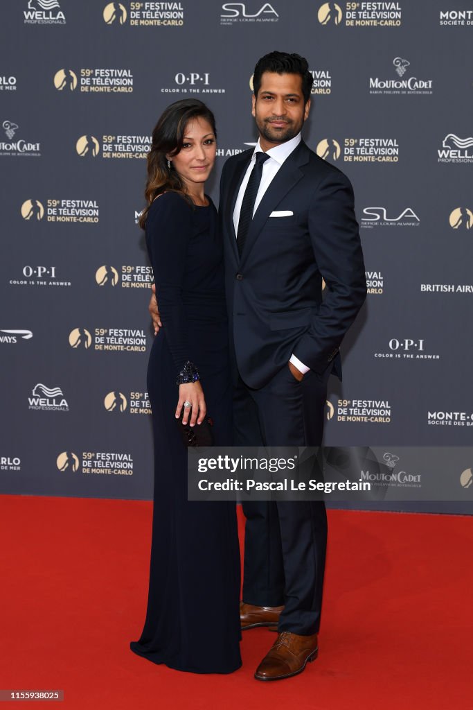 Christina Chang and Soam Lall attend the opening ceremony of the 59th