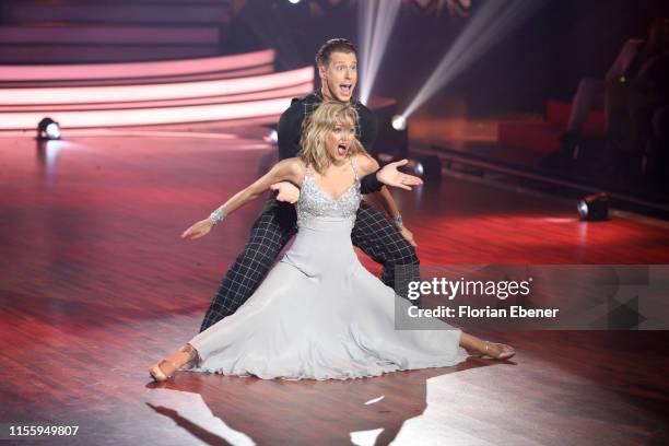 Ella Endlich and Valentin Lusin perform on stage during the finals of the 12th season of the television competition "Let's Dance" on June 14, 2019 in...