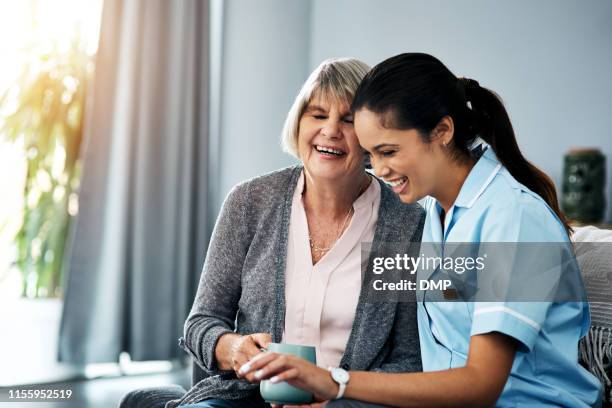 nothing lifts the spirit like laughter - nurse resting stock pictures, royalty-free photos & images