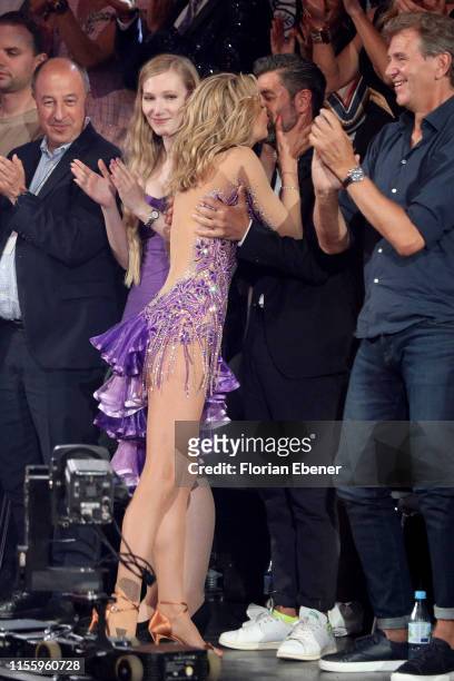 Ella Endlich kisses her partner Marius Darschin during the finals of the 12th season of the television competition "Let's Dance" on June 14, 2019 in...