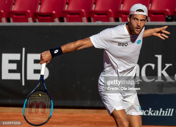 Joao Sousa of Portugal competes against Jozef Kovalik of Slovakia during the FTA singles tournament at the 2019 Swedish Open FTA on July 16, 2019 in...