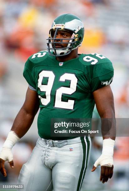 Reggie White of the Philadelphia Eagles looks on against the Tampa Bay Buccaneers during an NFL football game October 6, 1991 at Tampa Stadium in...