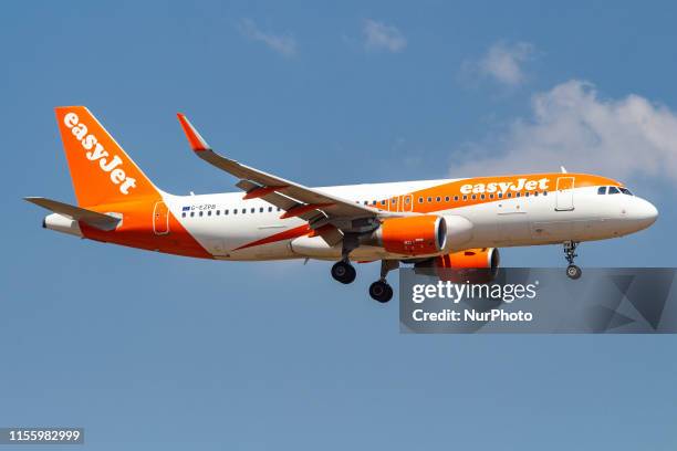 EasyJet Airbus A320-200 aircraft with registration G-EZPB landing at the Greek capital Athens at Eleftherios Venizelos International Airport AIA, ATH...