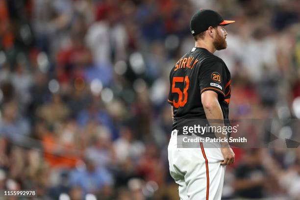 Pitcher Dan Straily of the Baltimore Orioles reacts after allowing a two-run home run to Michael Chavis of the Boston Red Sox during the fifth inning...