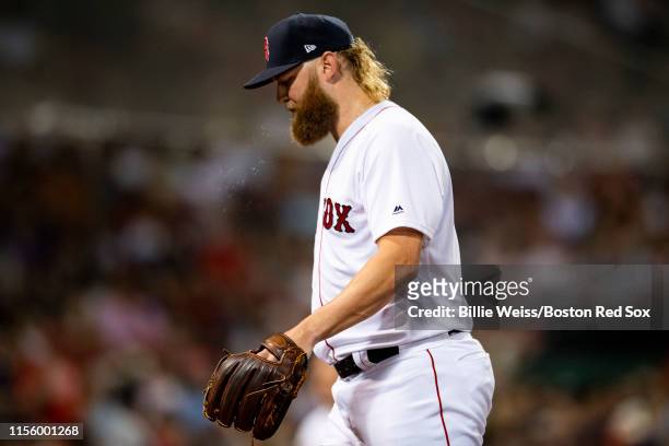 Andrew Cashner of the Boston Red Sox reacts as he exits the game during the sixth inning of his Boston Red Sox debut game against the Toronto Blue...