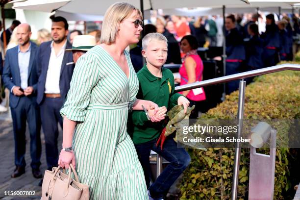 Amadeus Becker, son of Boris and Lilly Becker and his nanny during the CHIO 2019 Media Night on July 16, 2019 in Aachen, Germany.