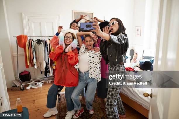 cheerful female friends gesturing while taking selfie - photographing bildbanksfoton och bilder