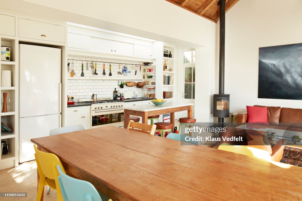 Dining table against kitchen counter at home