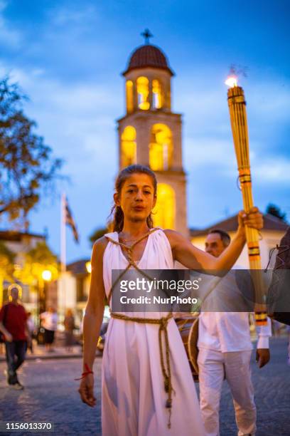 24rd Prometheia festival in Litochoro, Greece. Torchlight procession to celebrate the ancient Greek gods at the foothills of Mount Olympus. The...