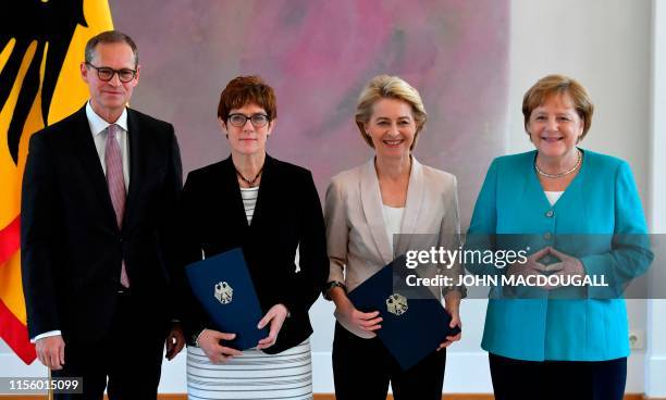 The vice-president of the Bundesrat Michael Mueller, the new German Defence Minister and leader of the CDU party Minister Annegret Kramp-Karrenbauer...