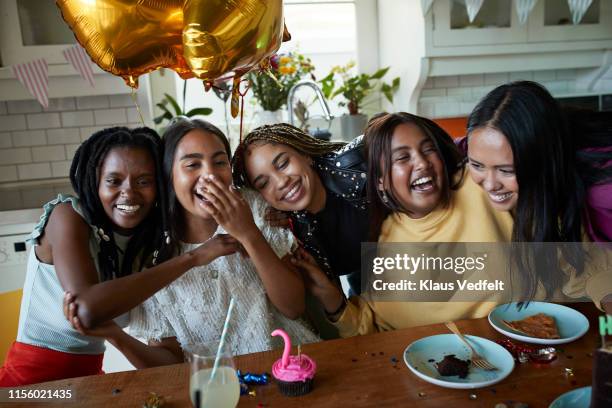 happy female friends in birthday party - 19 to 22 years and friends and talking stock pictures, royalty-free photos & images