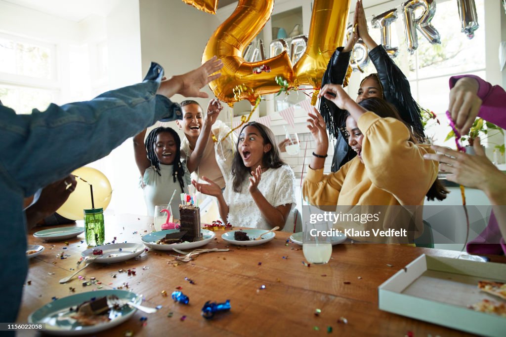 Cheering Point Party Friends Cheering For Woman In Birthday Party High-Res Stock Photo ...