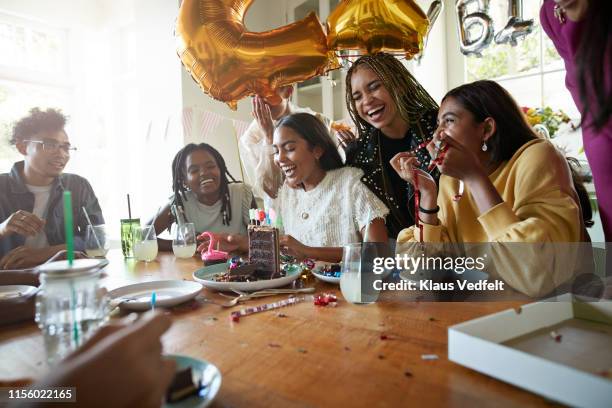 happy friends in birthday party at home - balloon woman party stock pictures, royalty-free photos & images