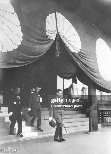 Japanese Emperor Hirohito , leaves the Yasukuni Shrine, where he paid tribute to the Japanese soldiers who died in Chinese campaign, Tokyo, Japan,...