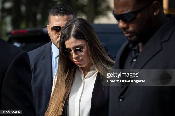 Emma Coronel Aispuro, wife of Joaquin "El Chapo" Guzman, is surrounded by security as she arrives at federal court on July 17, 2019 in New York City....