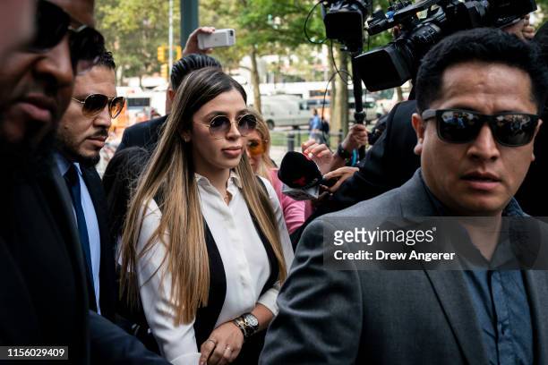 Emma Coronel Aispuro, wife of Joaquin "El Chapo" Guzman, is surrounded by security as she arrives at federal court on July 17, 2019 in New York City....
