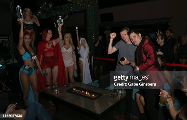 Daniel Rocco and producer Dave Bryant get bottle service from Hustler Honeys dressed in outfits inspired by the "Game of Thrones" television series...